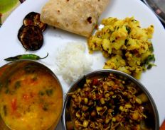 Jeera_aloo_served_with_sprouts_and_dal